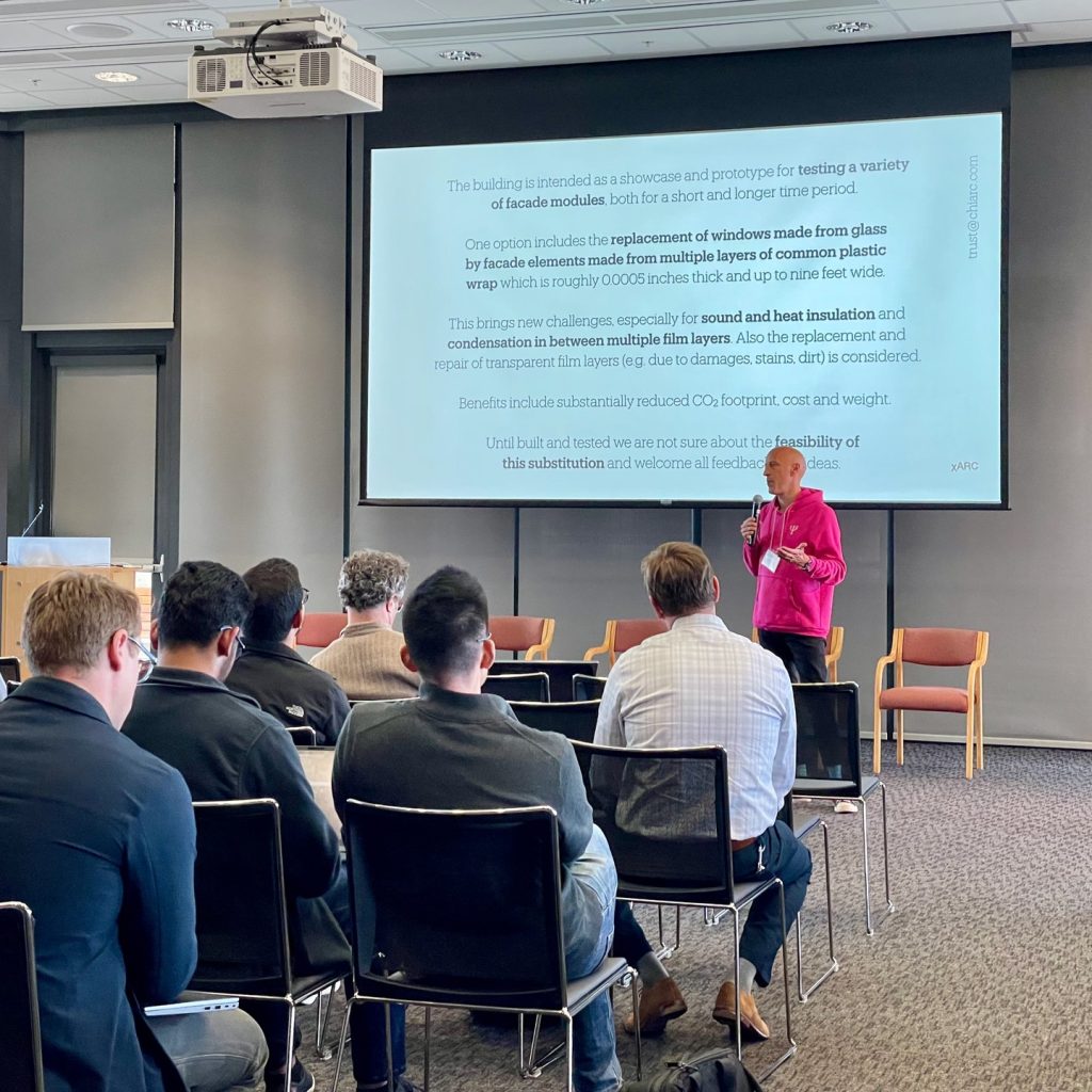 Ansgar Halbfas in front of an audience at the Center for Integrated Facility Engineering proposing one concept idea to further investigate and asking for advice from Stanford PhD students.